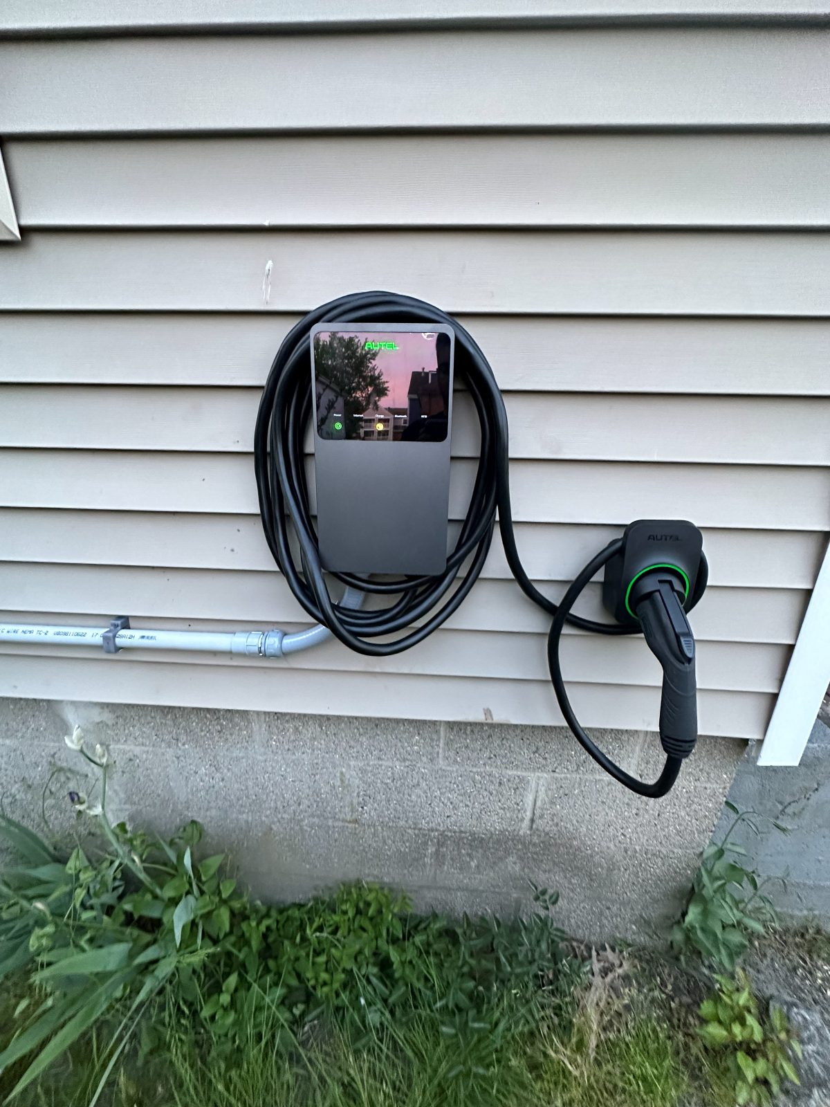 Wall-mounted EV charger