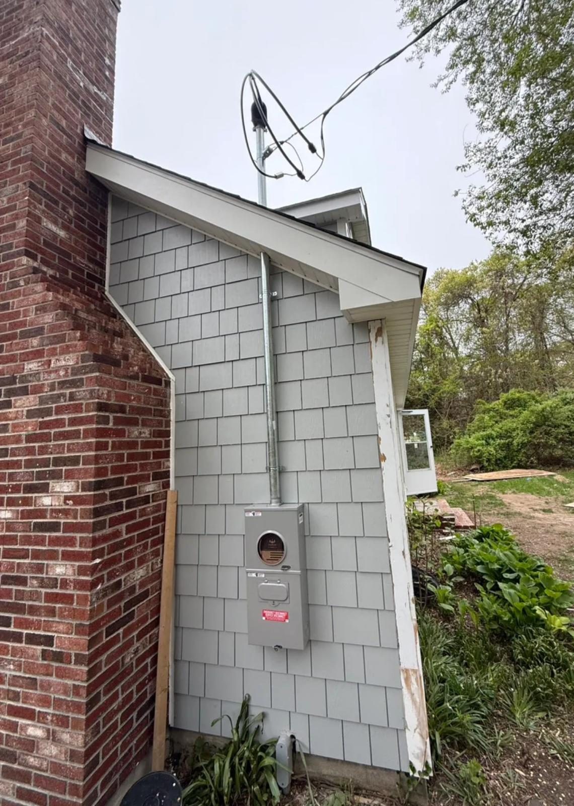 Meter on a shingle house
