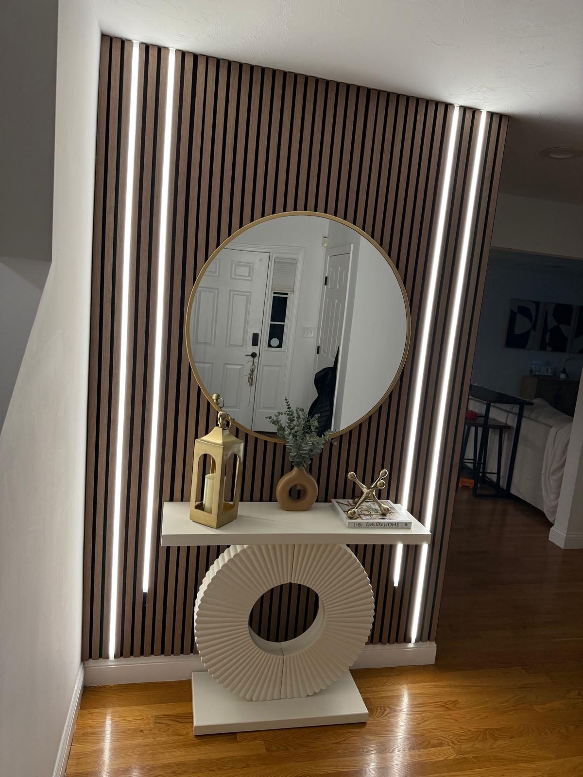 Slat wall with vertical LED strips